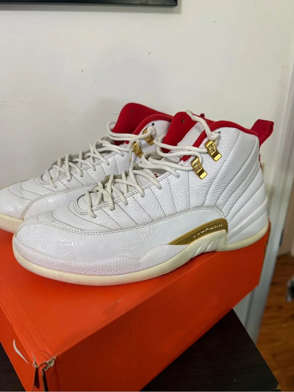 Jordan Men’s White Basketball Sneakers with Red Lining and Gold Accents